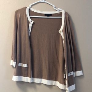 Tan and white, golden buttons. Never worn